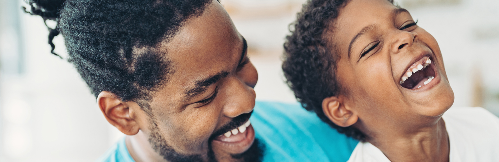 father-and-son-laughing-1600x522.jpg