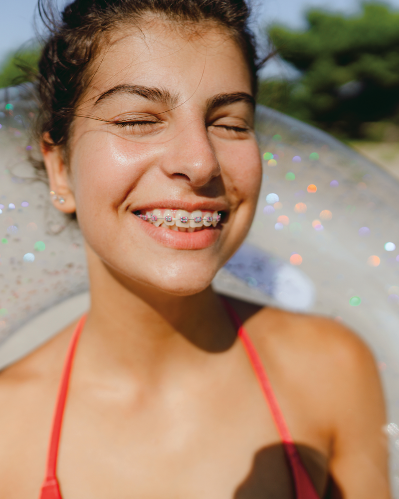 girl-with-braces-smiling-800x1000.png