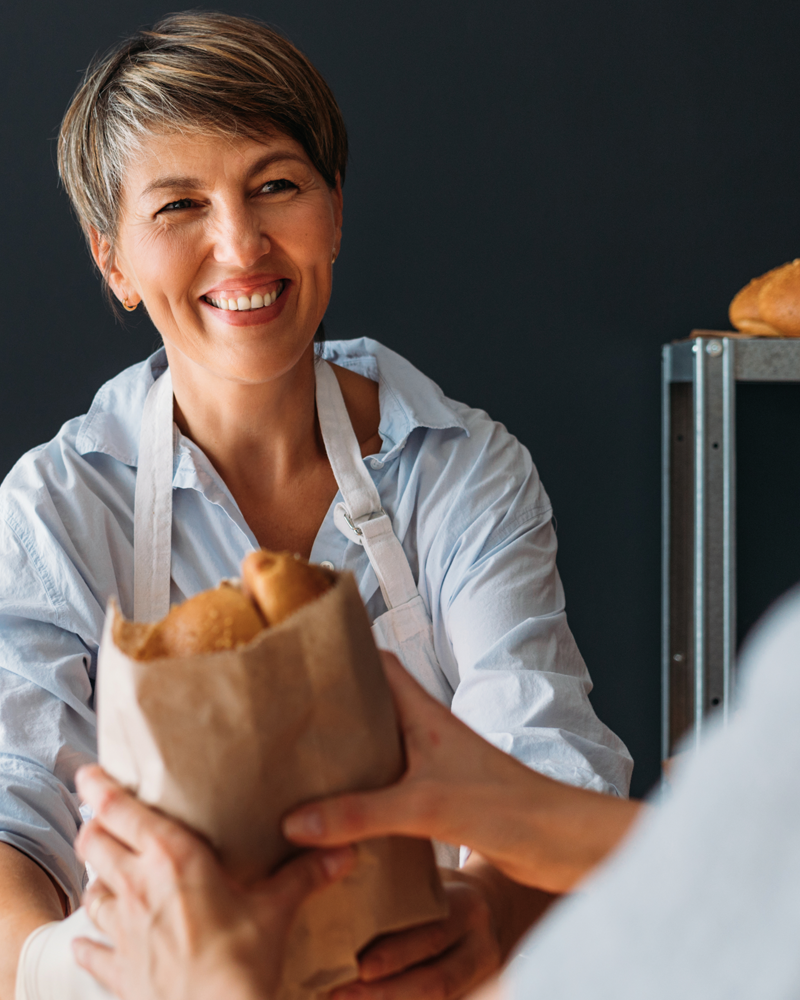 woman-selling-bread-800x1000.png