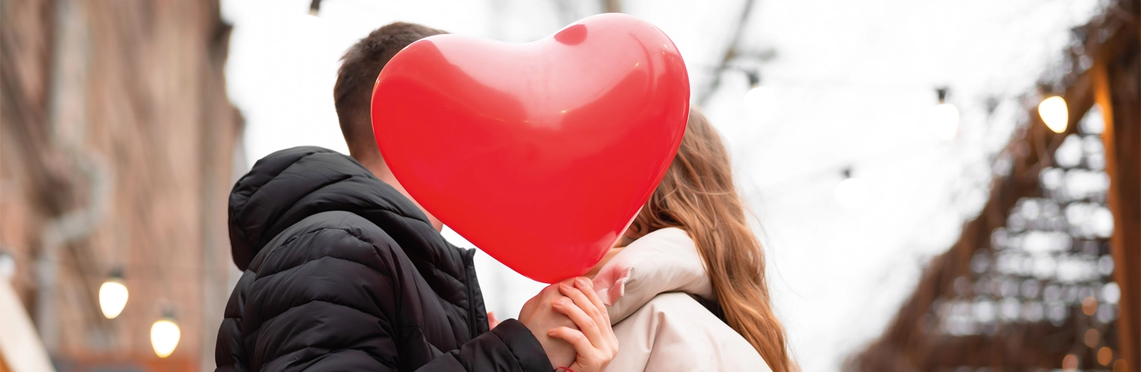 couple-with-heart-shaped-balloon-1600x5221.webp